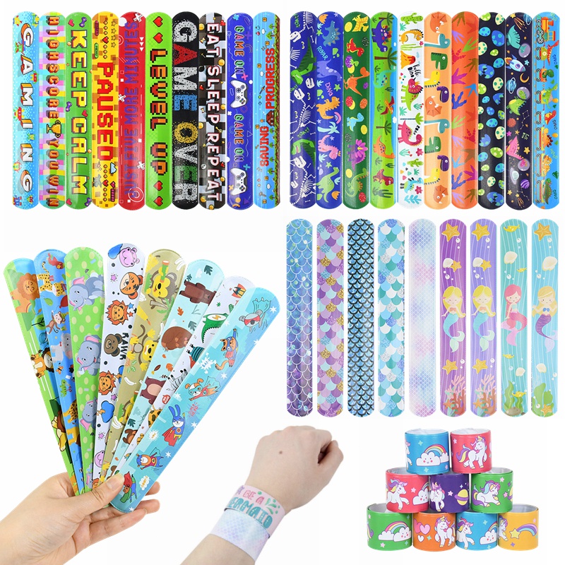 10pcs Dinossauro Festa De Aniversário Unicórnio Bofetada Pulseiras Snap Bands For Kids Party 1a Boy Roar Favorita Presente