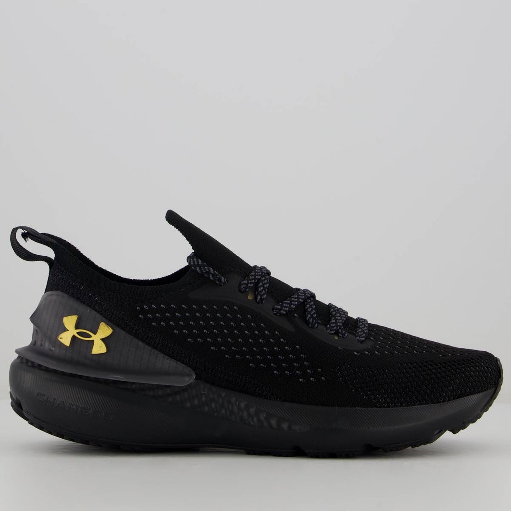 Tênis Under Armour Charged Quicker Preto e Dourado em Oferta na Shopee