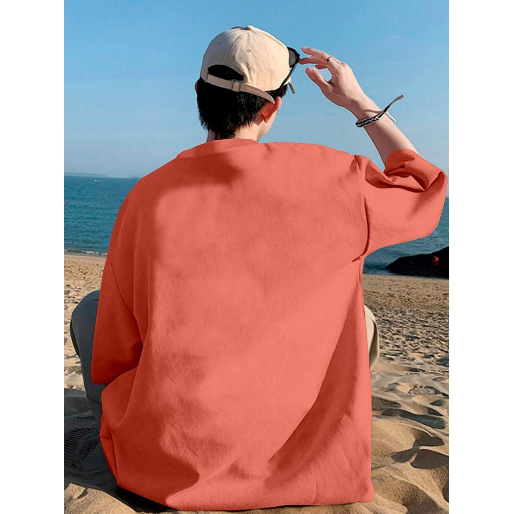 Camiseta Larga Coral Confortável Blusa Fitness Sem Estampa Básica Oversized Longa Esportiva Lisa
