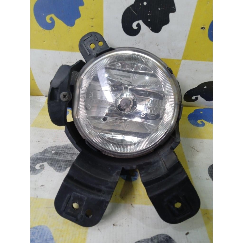 Farol Milha Lado Esq.  Tracker 2013- 2016