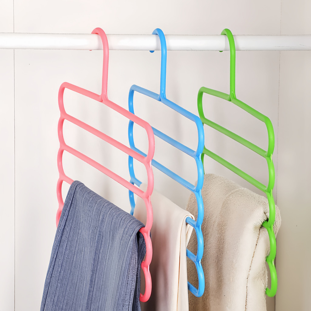 Economiza cinco vezes mais espaço, porta-calças de plástico cabides, pendura 5 pares de calças e é antiderrapante em Oferta na Shopee