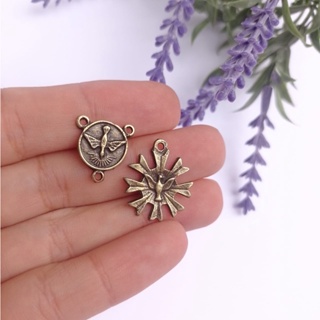 30 pingentes + 30 Entremeios do Divino Espirito Santo para artesanatos - Kits p/ Dezenas Divino Ouro Velho em Oferta na Shopee