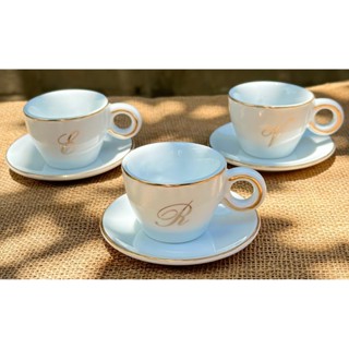 1 Xícara c/ pires 75ml person. inicial ouro + filete ouro em Oferta na Shopee