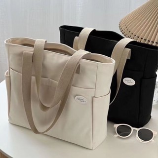 Saco de lona Fêmea Novo Estilo Coreano Versão de um ombro Portátil para todas as compras escolares Versão coreana de grande capacidade