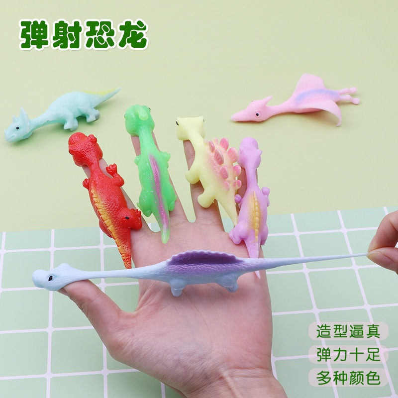【3pcs】Dinossauro Catapulta  Divertido Lançamento de Dardos de Dedo Descompressão Borracha Macia