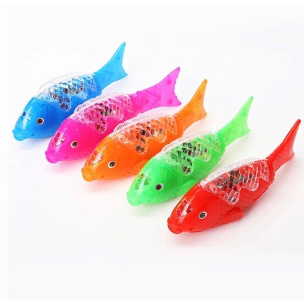 Peixe musical com luz LED e brinquedo que abanam o rabo em Oferta na Shopee