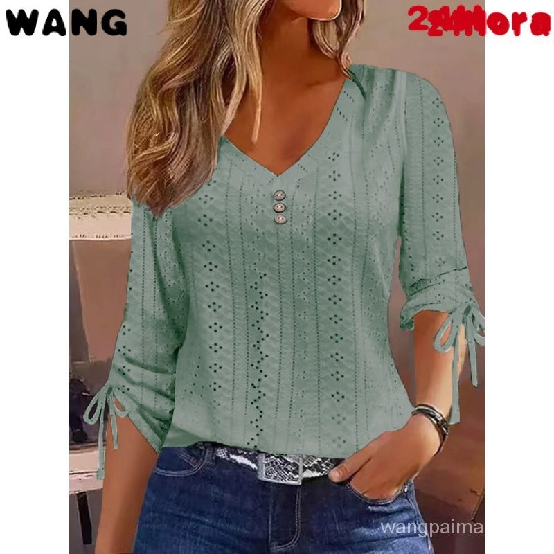 Camiseta feminina de manga comprida solta com botão jacquard de cor sólida com decote em V