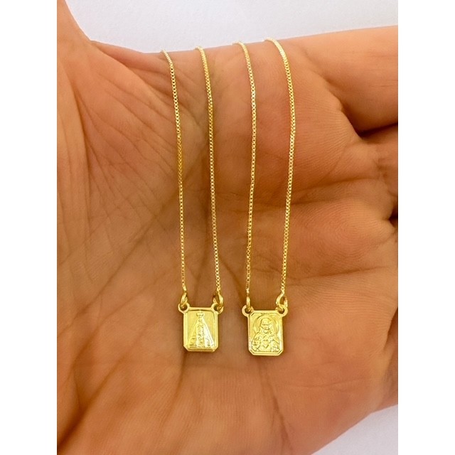 Escapulário Nossa Senhora Aparecida e Sagrado Coração de Jesus folheado a ouro 18K.