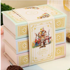 05 Kits com 3 Livros - (15) Embalagem 2 MINI OVOS 50G OU 6 doces + Cinta TRIOLOGIA 3976 (PASCOA JANGO OUTLET)