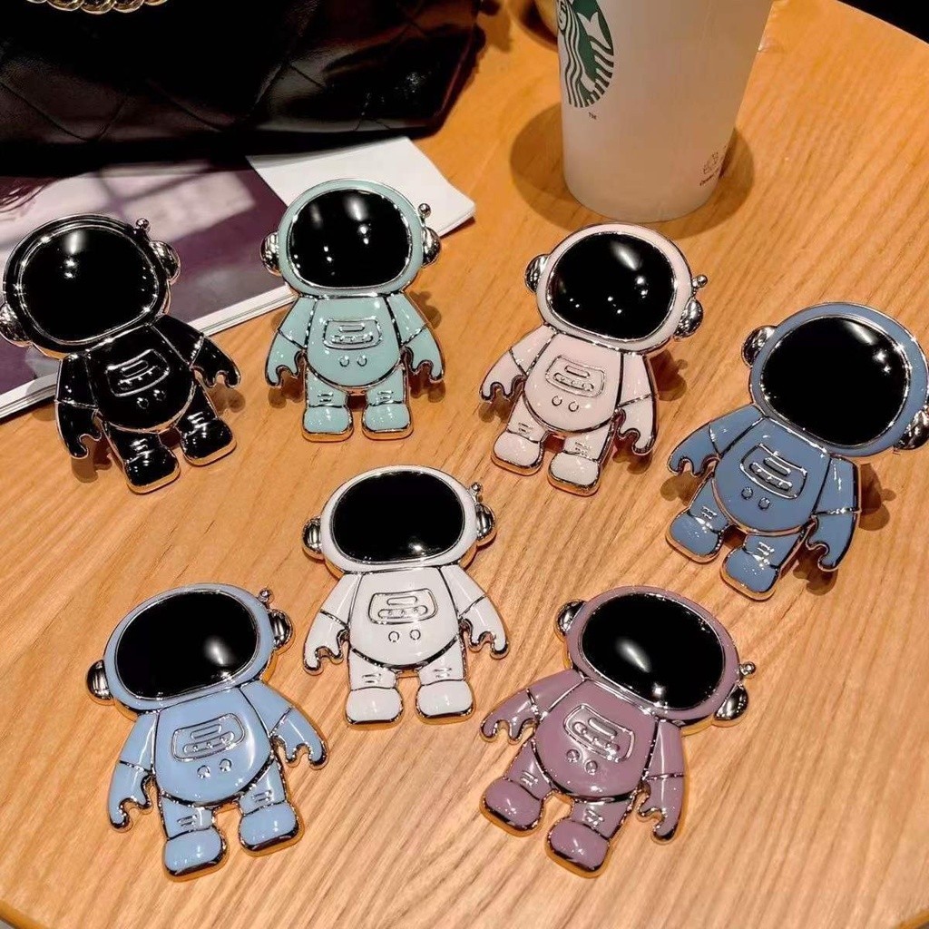 Astronauta com suporte telefônico DGE em Oferta na Shopee