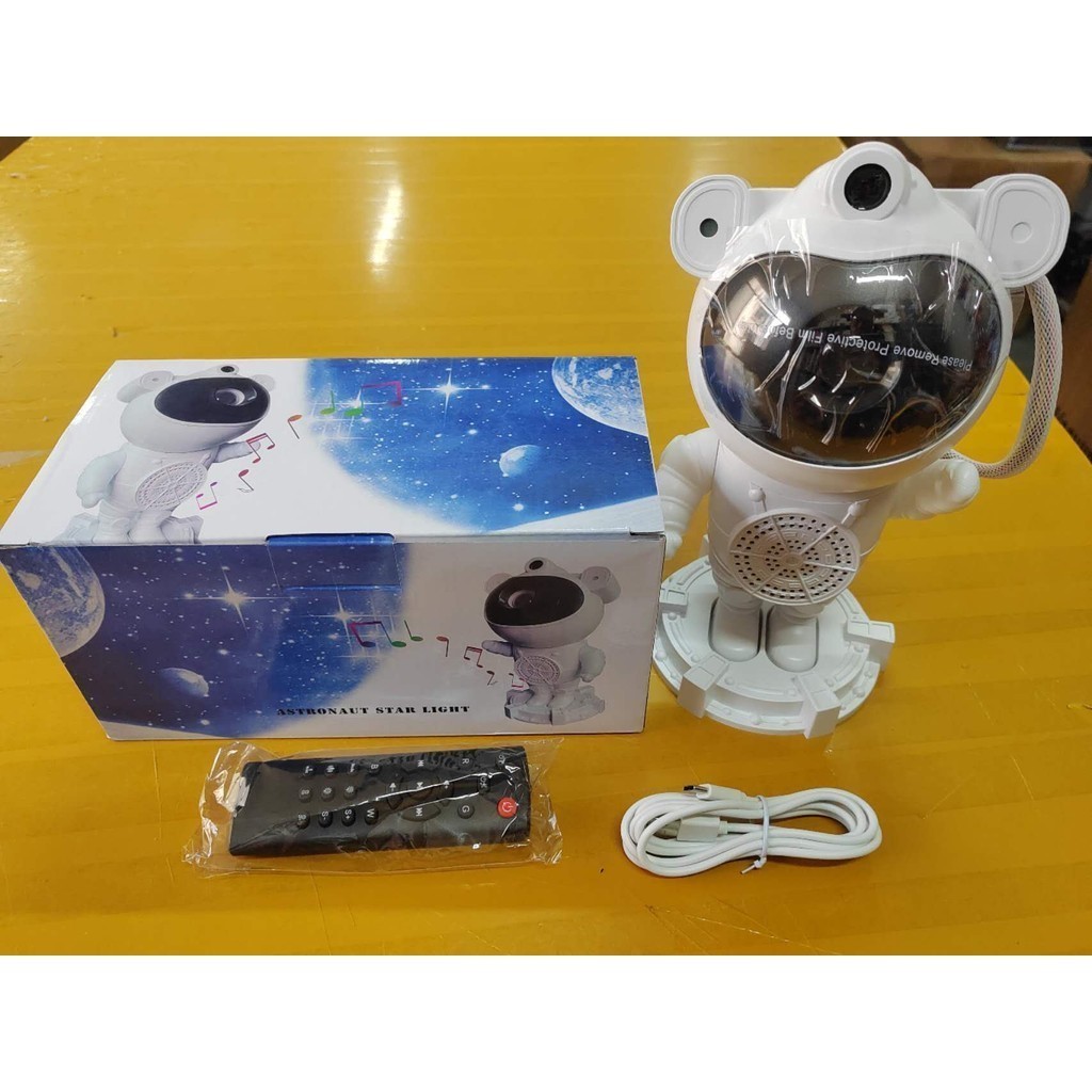 Astronauta Luminária e Projetor De Estrelas e Lua  e Caixa de Som Bluetooth