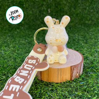 Chaveiro de Coelho Respingos Dourados - Creme - 5,5cm - 1 unidade - Rizzo em Oferta na Shopee