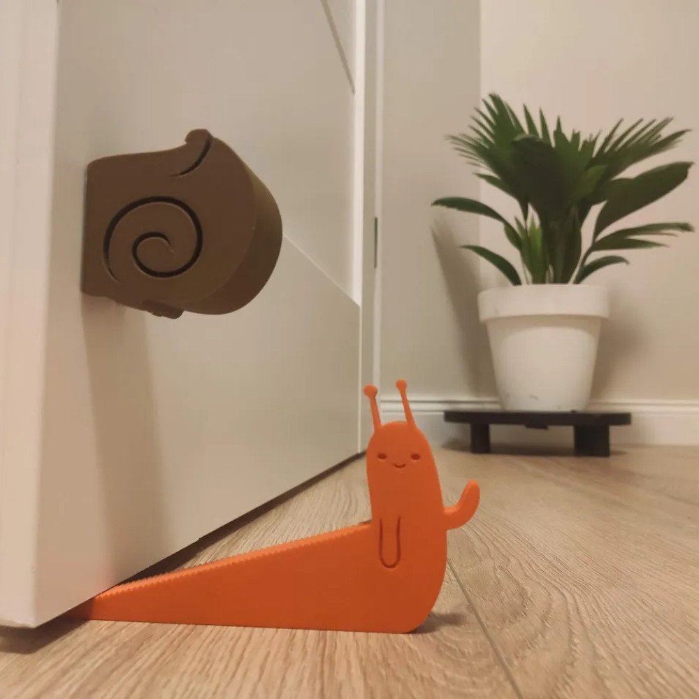 Suporte Trava Porta Sticker CARACOL COM CASULO 2EM1  Aparador Peso Trava Porta Cunha Calço Divertido