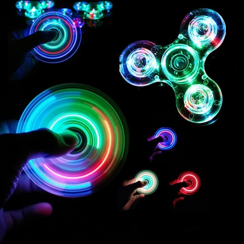 Luz LED Luminosa Fidget Giratória De Mão Em Escura EDC Figet Spiner Finger Stress Alívio De Brinquedos em Oferta na Shopee