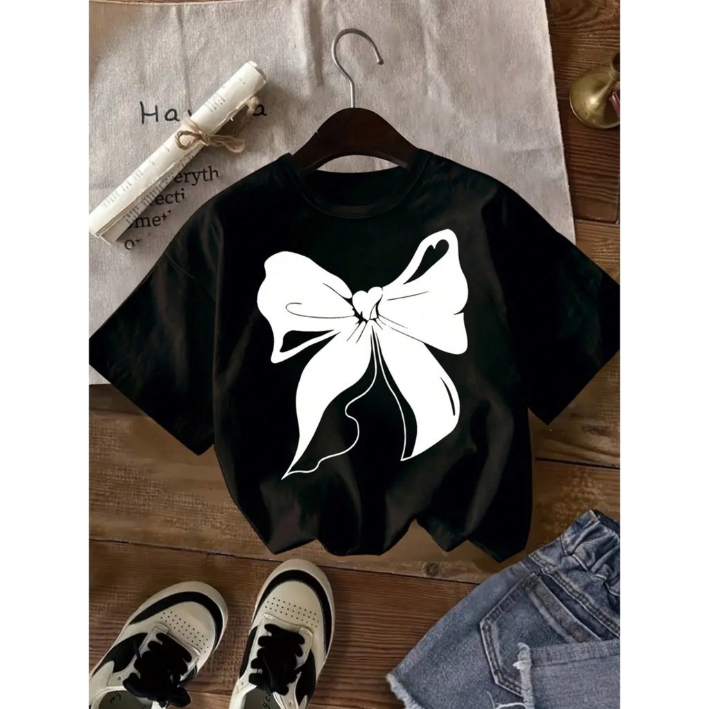 Camiseta Manga Curta Gola Redonda Estilo Oversized Casual Colorida Infantil Simples Ideal Para Meninas Estampa De Laço em Oferta na Shopee