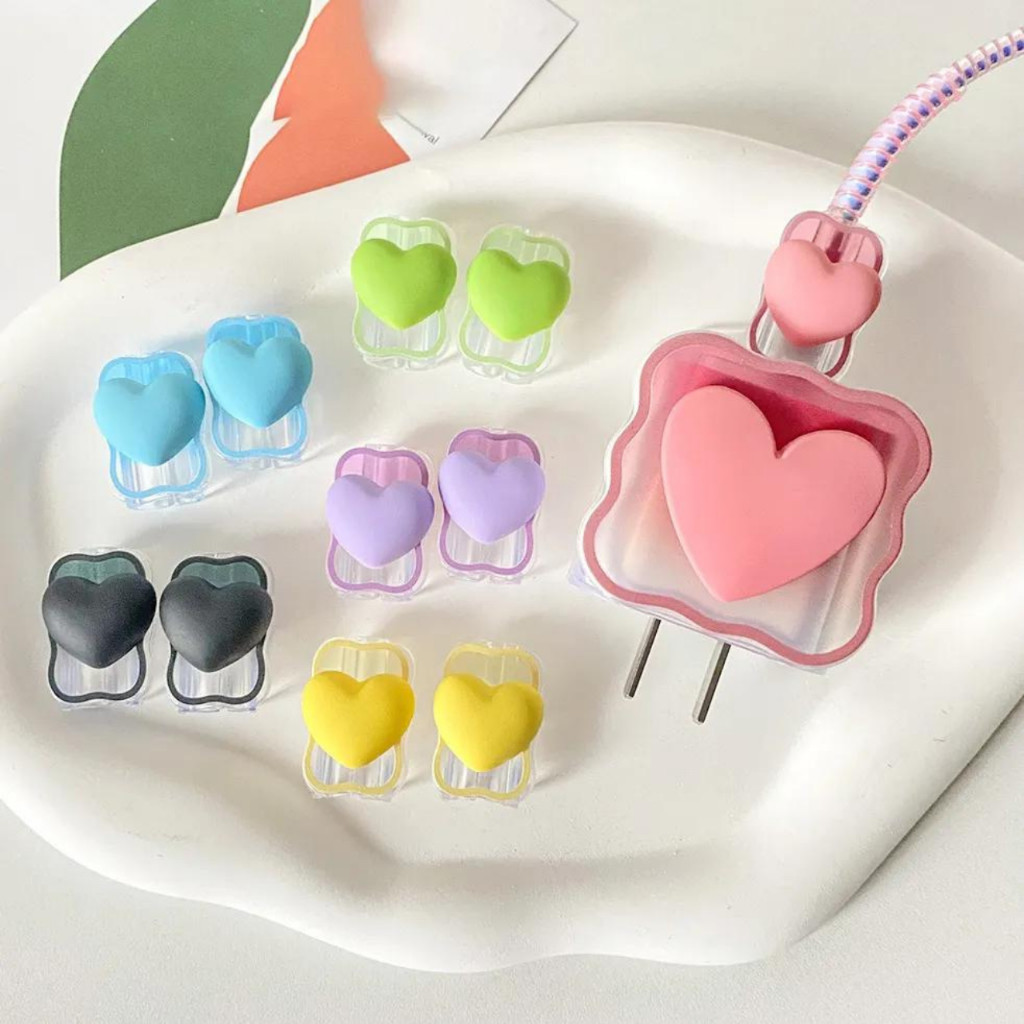 Capa Protetora de carregador cabo e fonte decoração para Carregador IPHONE 18 e 20w tampa CORAÇÃO em Oferta na Shopee