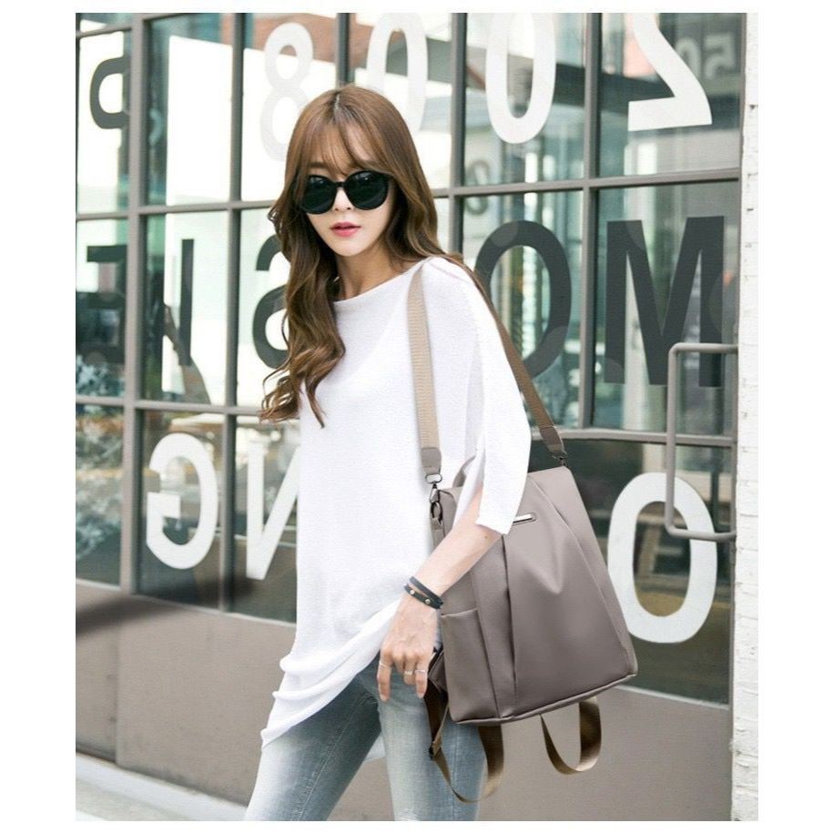 Mochila bolsa feminina de novo estilo casual leve e multifuncional 2205 em Oferta na Shopee