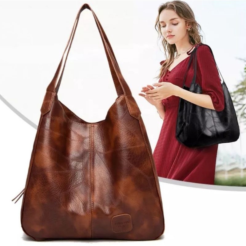 Bolsa Feminina saco ombro média couro sintético promoção em Oferta na Shopee