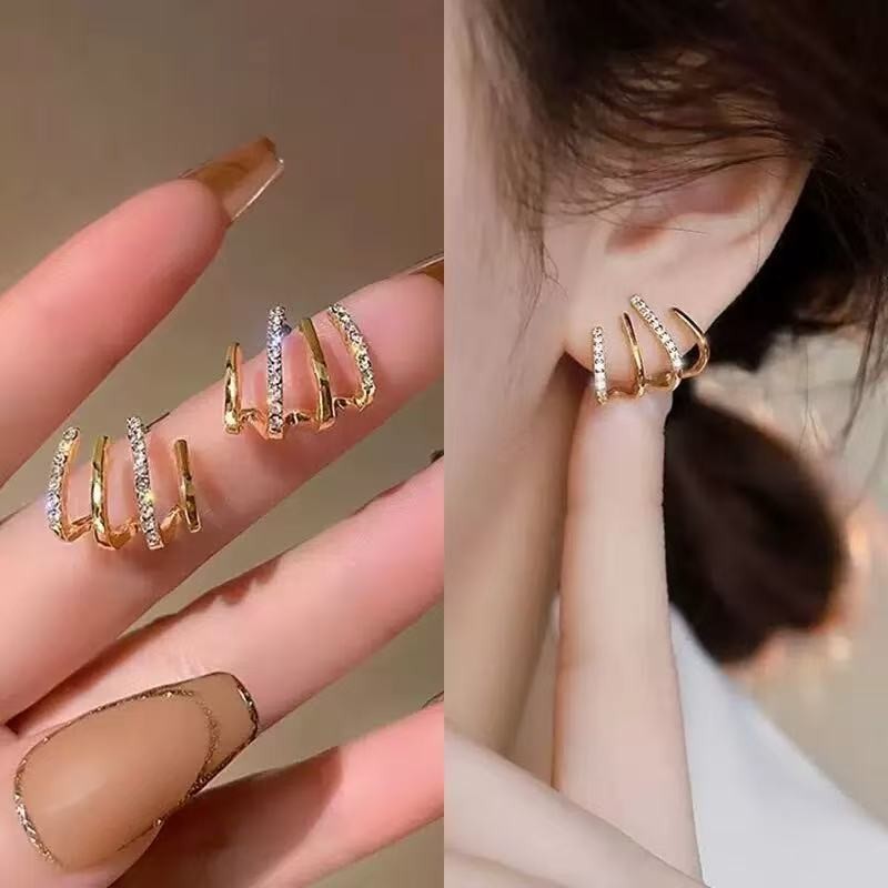 Brincos de alta qualidade com incrustações de diamantes e um design geométrico de agulhas de zircônia com quatro garras em Oferta na Shopee