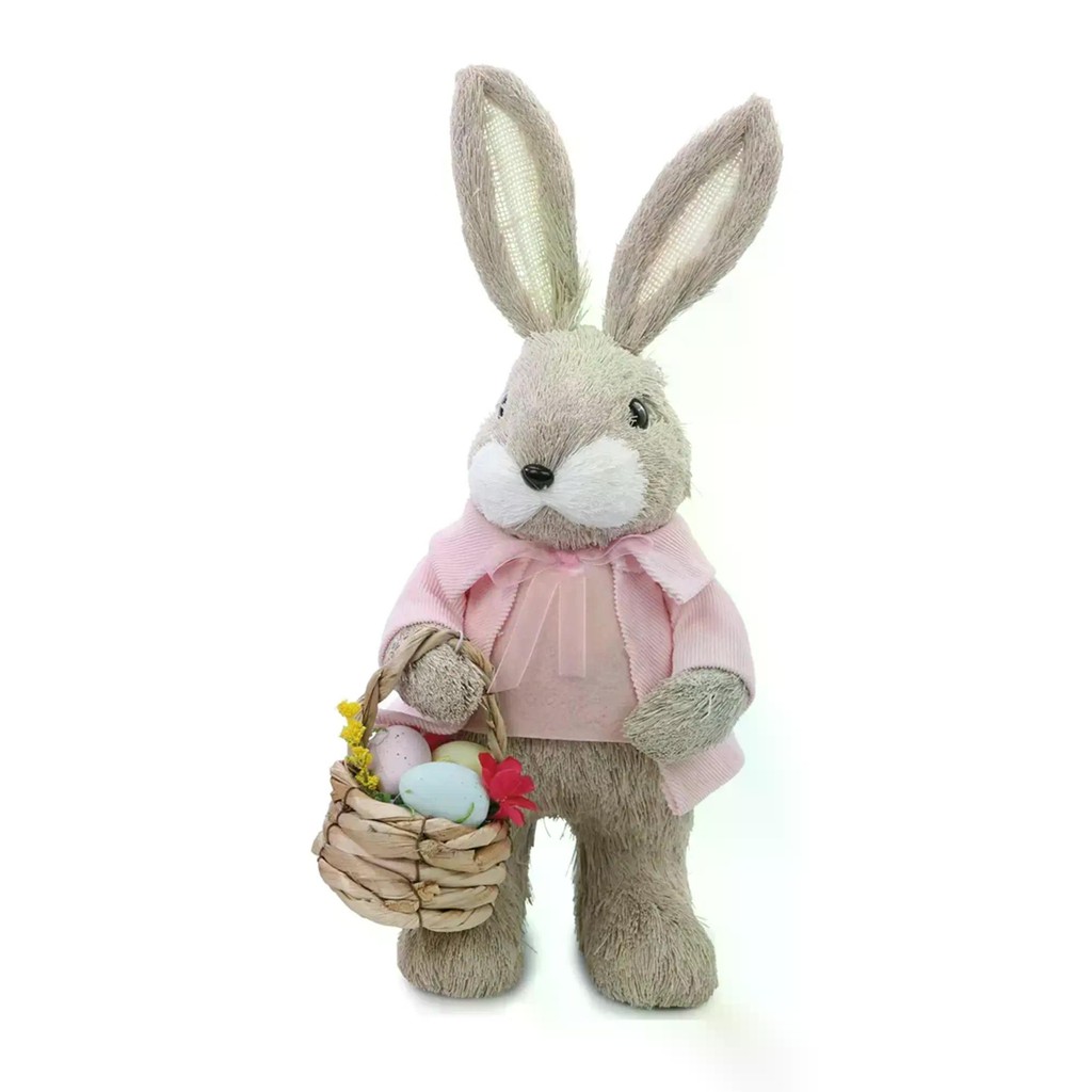 COELHA EM PÉ COM CESTA DE OVOS E ROUPA ROSA RIVIERA