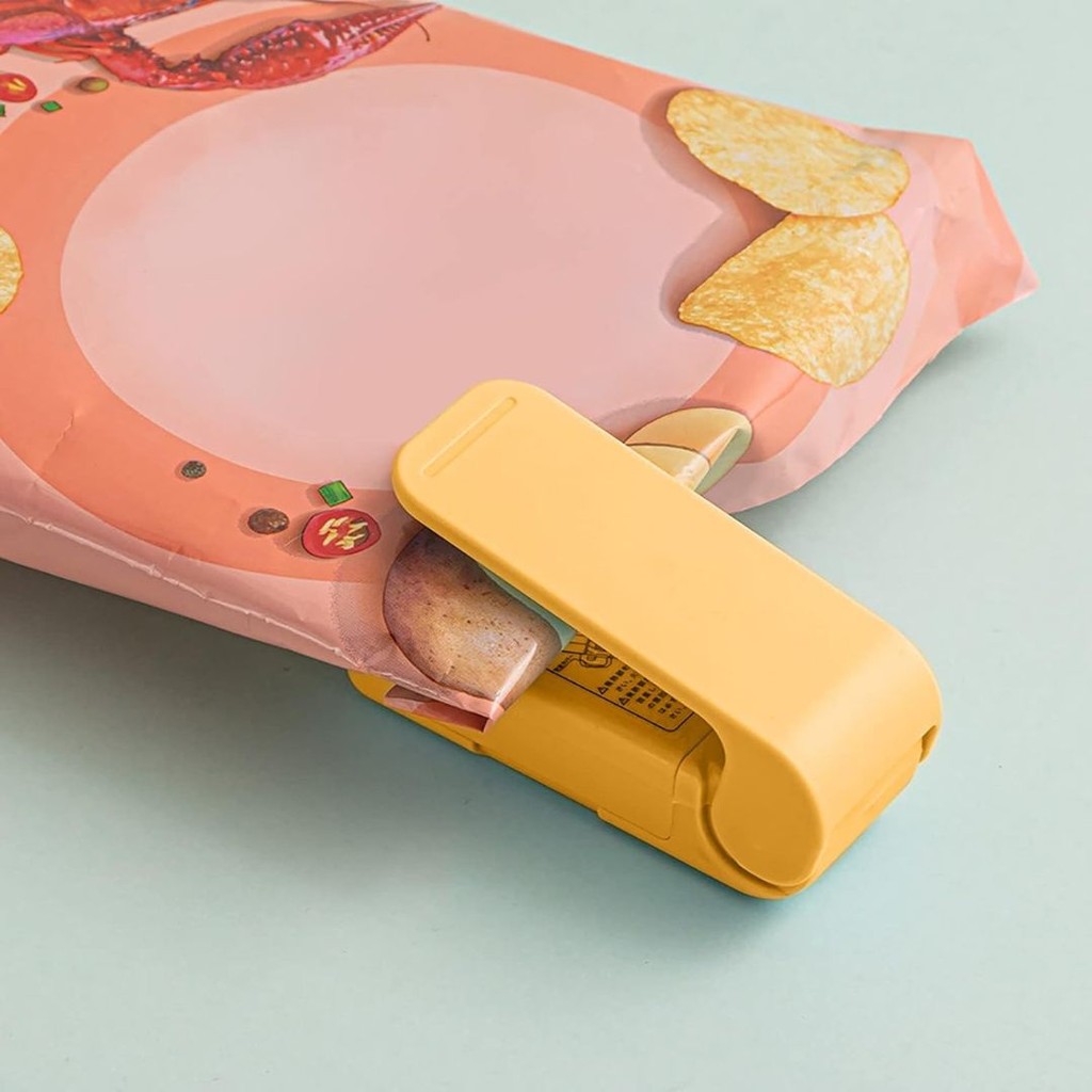 Mini Máquina de Selagem P/ Embalagens Portátil Amarelo - Vencedor