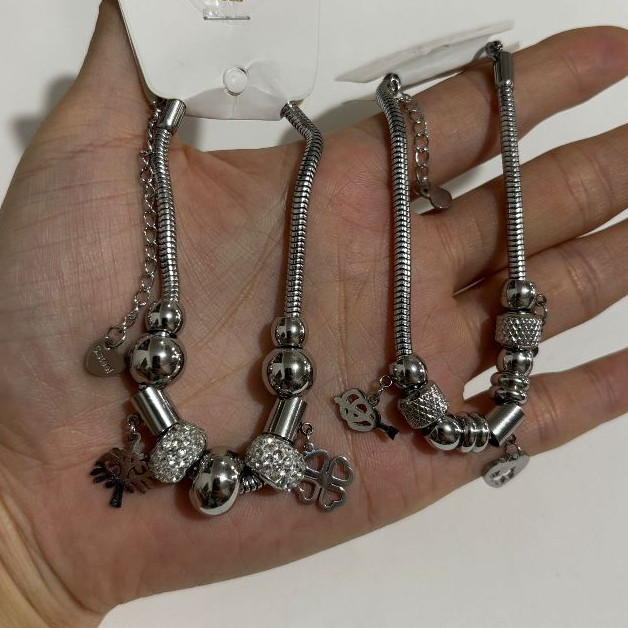 Kit 1 ate 6 Unidades Pulseira Com Berloque Aço Inoxidável em Oferta na Shopee