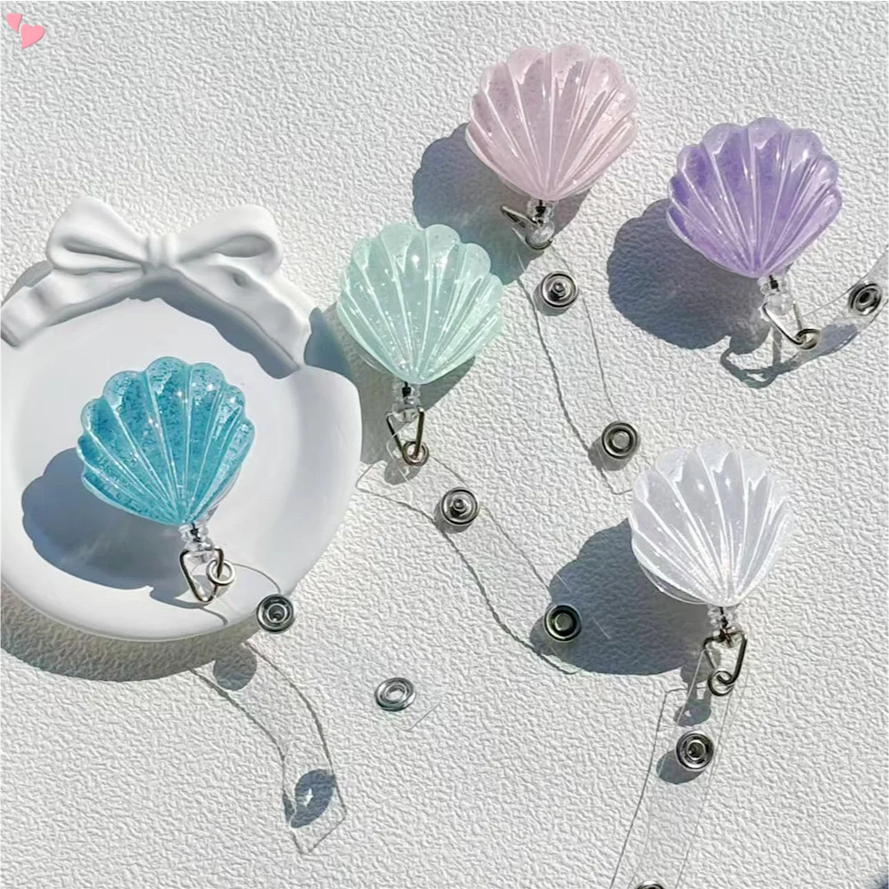 Porta-Crachá Retrátil Em Forma De Concha , Carretel De Plástico Leve Com Clipe De Jacaré Para Chaveiro De Cartão De Nome em Oferta na Shopee