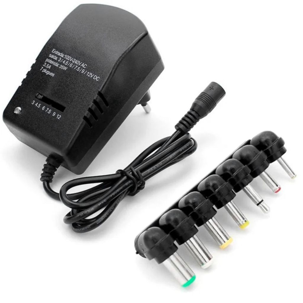 Fonte Carregador Universal 3v  4.5v 6v 7.5v 9v 12v Bivolt 7 Plugues Notebook Roteador Camera Casa