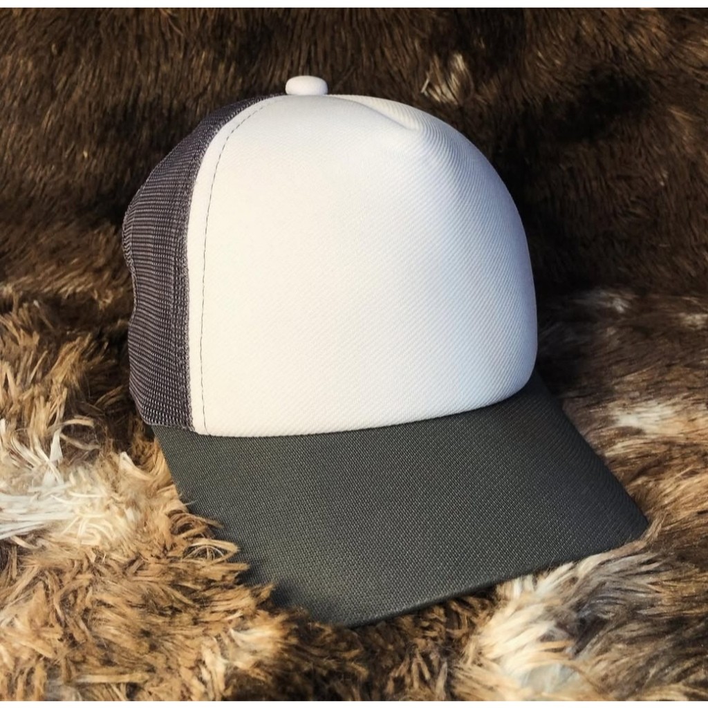 Boné liso modelo trucker de tela e aba curva varias cores.