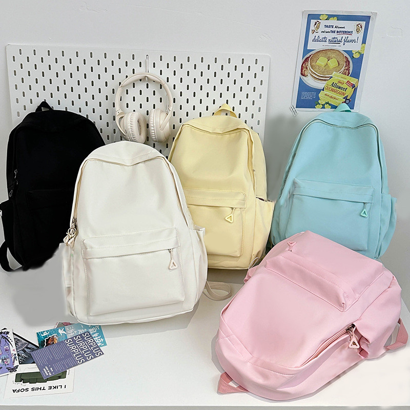🎄Mochila Impermeável de Grande Capacidade e Estilo Minimalista, Unissex para Estudantes