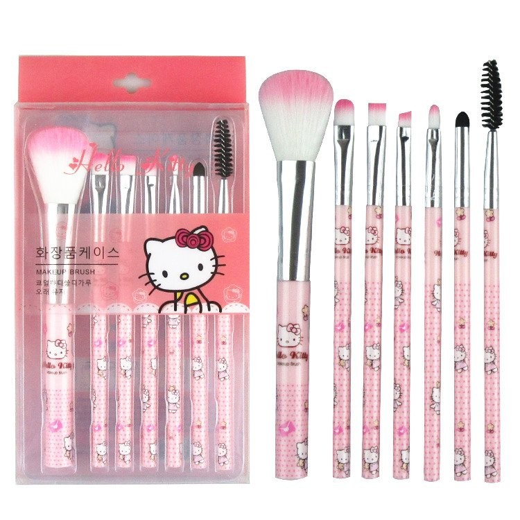 Conjunto de 7 pincéis de maquiagem da Hello Kitty com cabos estampados na cor rosa e estojo protetor transparente.