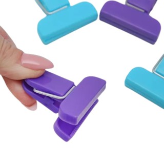 Kit 4 prendedor de embalagens Plástico 3,8 cm x 4 cm. em Oferta na Shopee