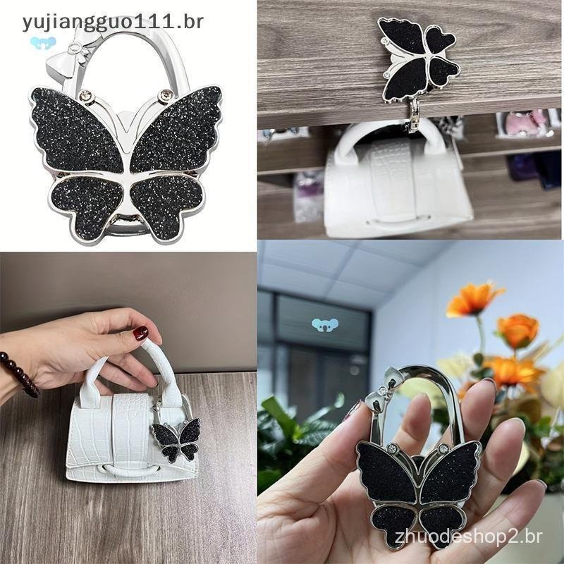 # Novo Portátil Borboleta-Laço Saco De Mesa Gancho Moda Multifuncional Dobrável Senhoras Fivela Bolsa Para Pendurado .