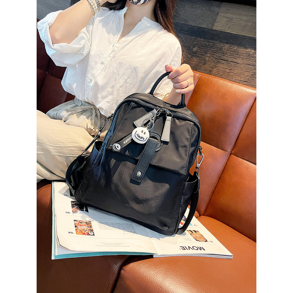 Mochila feminina 2025 novo estilo na moda bolsa de ombro mochila saco de viagem Oxford pano luz moda lazer saco de viage