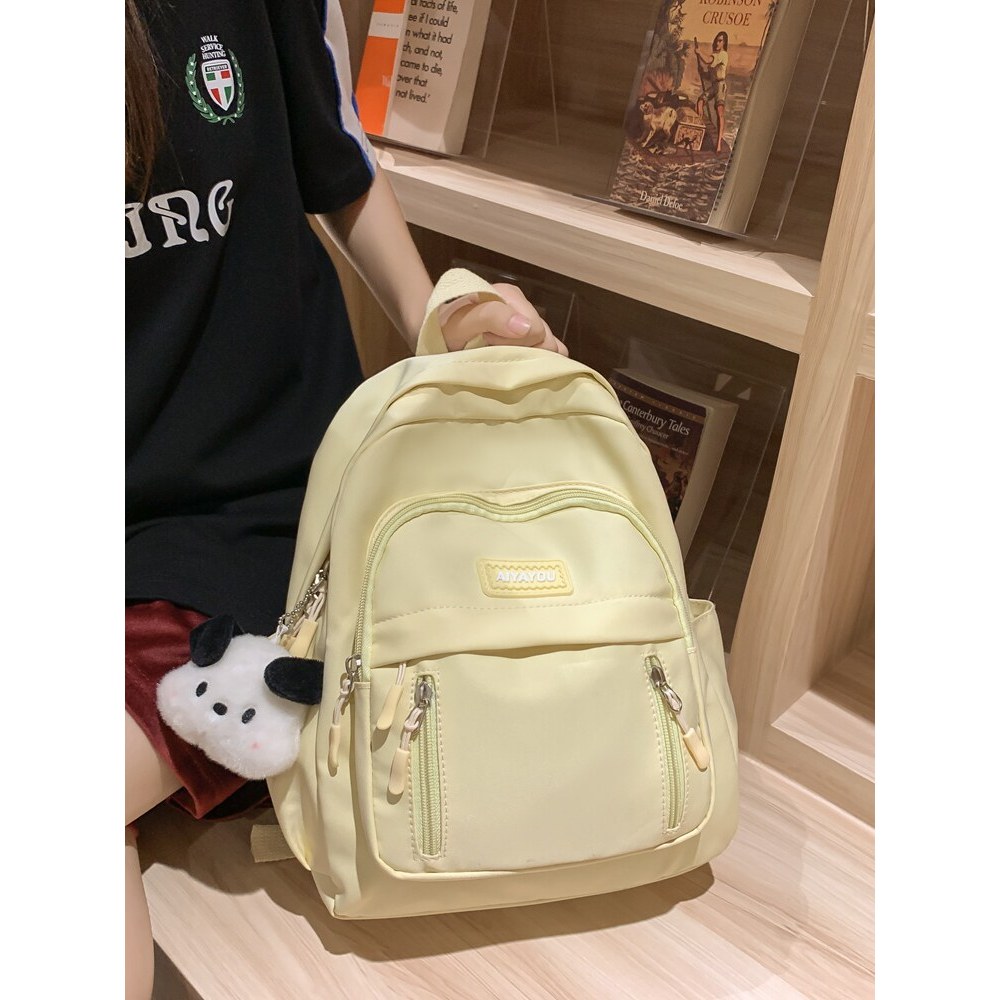Doce legal de alto valor menina Casual pequena mochila cor sólida fresco estudante mochila feminina mochila de viagem