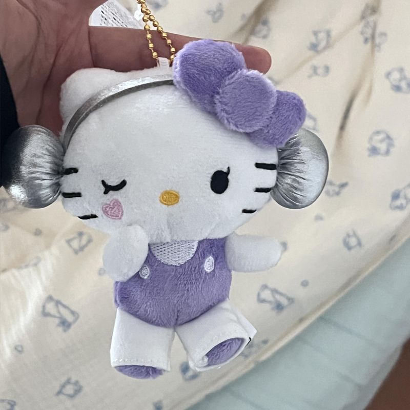 Pingente de fone de ouvido Hello Kitty, bolsa de pelúcia do gato KT, mochila, chaveiro fofo, ornamento pendurado, acessó