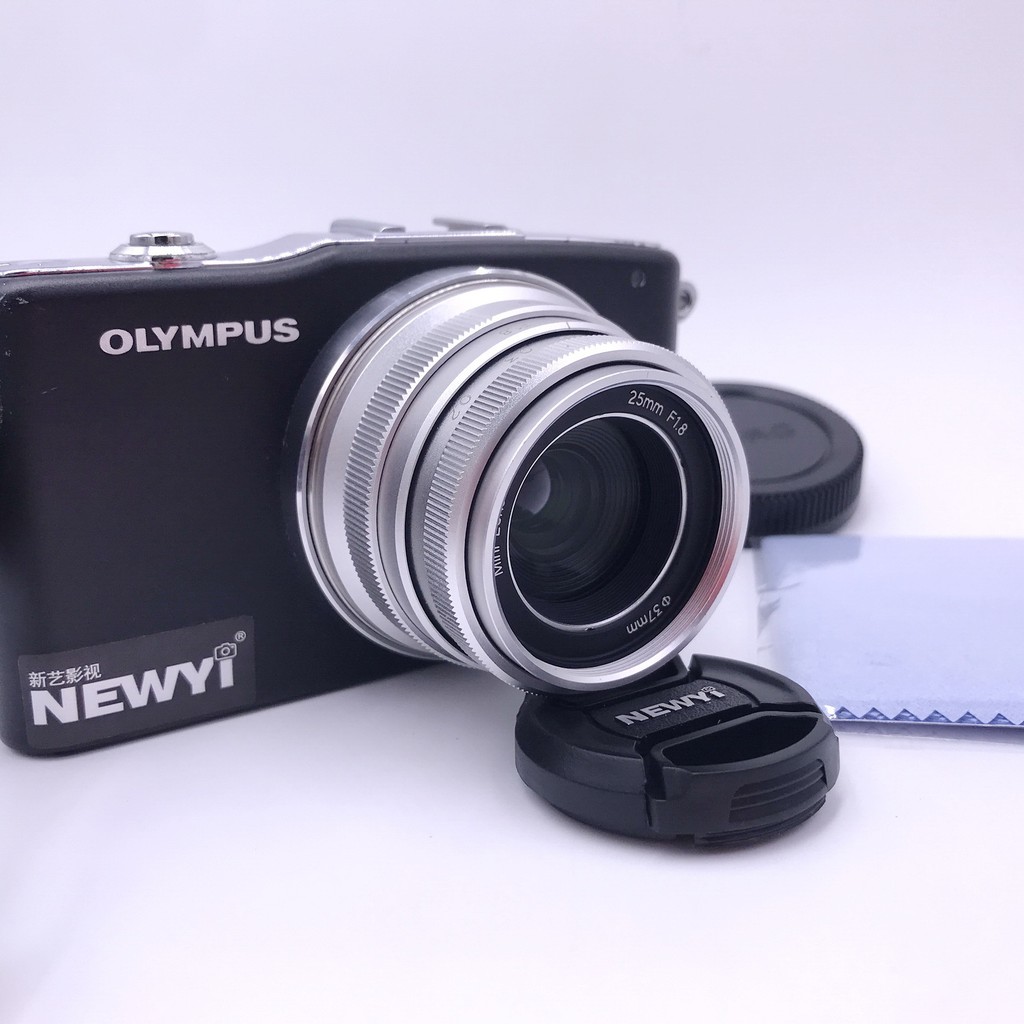 Lente Xinyi MINI 25mm Mark II Prata com Montagem Integrada FX NEX M4/3 EOS M