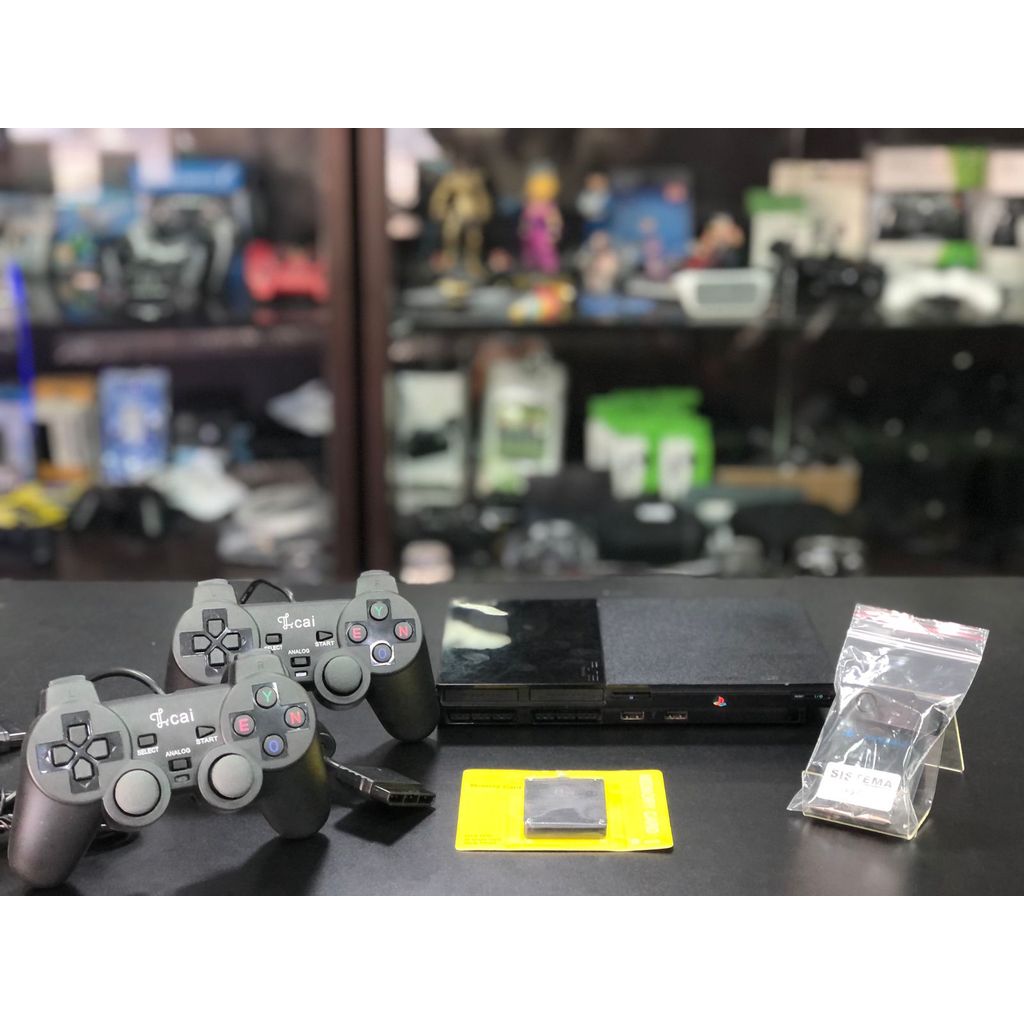 Playstation 2 Slim O.P.L 02 controles c/fio paralelo + 02 memory card + 03 jogos fisicos - usado