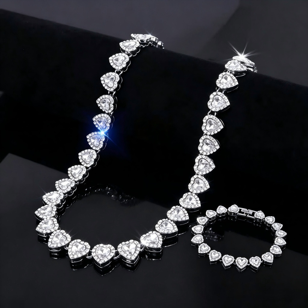 Exquisito conjunto de colar e pulseira feminino, adornado com corações de zircônia banhados a prata, é um presente para