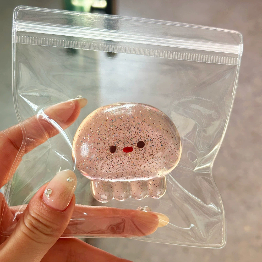 Brinquedo de água-viva transparente da Little Red Book com brilho fino, alto valor estético, fofo, alivia o estresse e é
