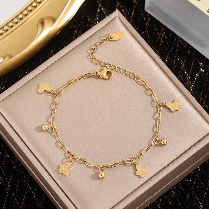Pulseira borboleta de aço titânio banhado a ouro 18K feminina elegante pulseira de borla colorida