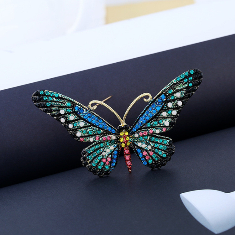 Versão coreana Retro senhoras High-End senhoras borboleta diamante broche camisola terno casaco All-Match elegante Corsa