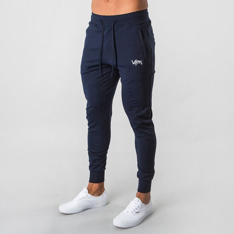 Músculo masculino esportes calças de Fitness correndo treinamento solto calças magras Casual estiramento respirável Swea
