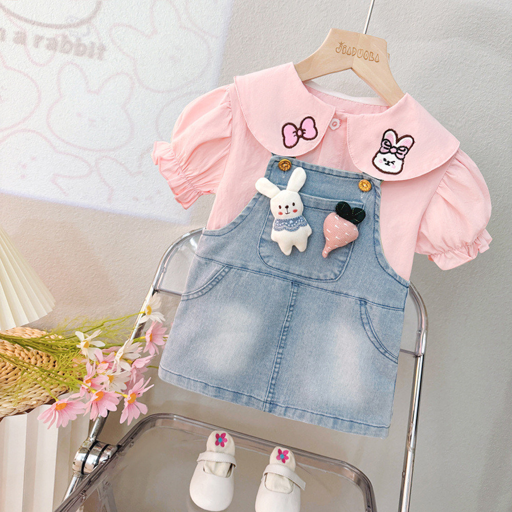 Conjunto de Manga Curta para Bebê em Estoque 1-4 Anos Menina Top de Coelho Rosa + Saia Jeans com Suspensório Conjunto de