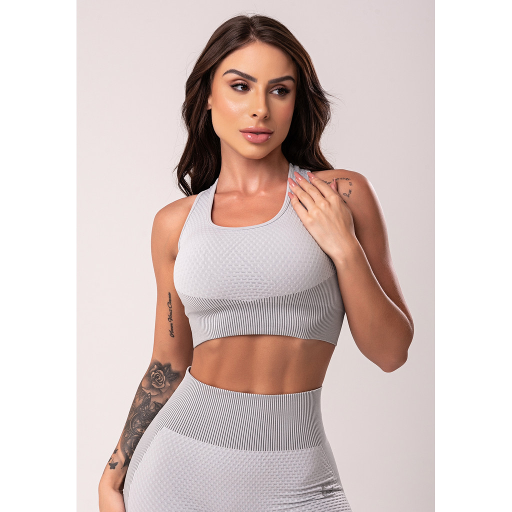 TOP FITNESS FEMININO TEXTURIZADO COM BOJO E ALÇAS CRUZADAS SEAMLESS DLK em Oferta na Shopee