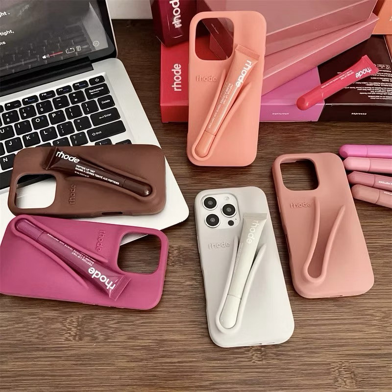 Kit 2pçs Capa De Telefone + Batom RHO DE Com Logotipo Silicone Para iPhone 15PM 11 12PM 13PM 14PM 16E 11 Hailey em Oferta na Shopee