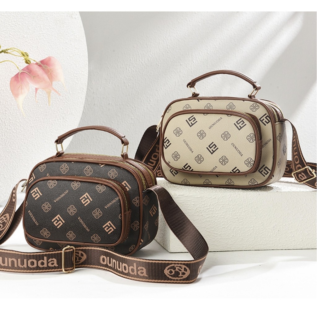 Bolsa feminina de alta qualidade, versátil, com alça única e opção de bolsa transversal para mães. em Oferta na Shopee