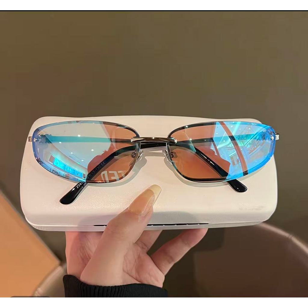 Óculos de sol femininos sem aro e formato olho de gato em metal 599 em Oferta na Shopee