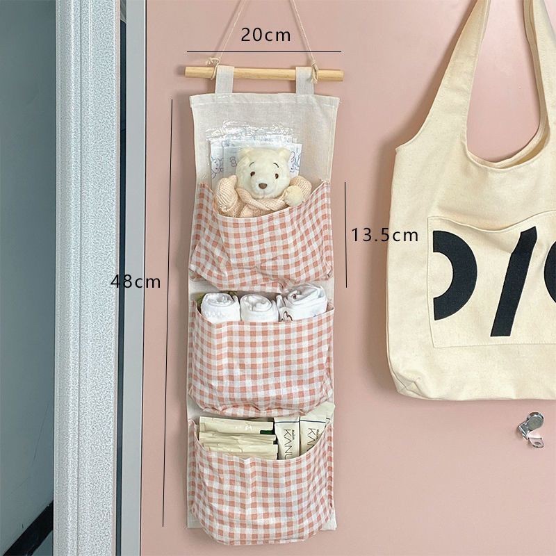 Frete grátis xadrez simples tecido saco de armazenamento de três camadas saco de armazenamento porta do quarto pendurado