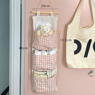 Frete grátis xadrez simples tecido saco de armazenamento de três camadas saco de armazenamento porta do quarto pendurado